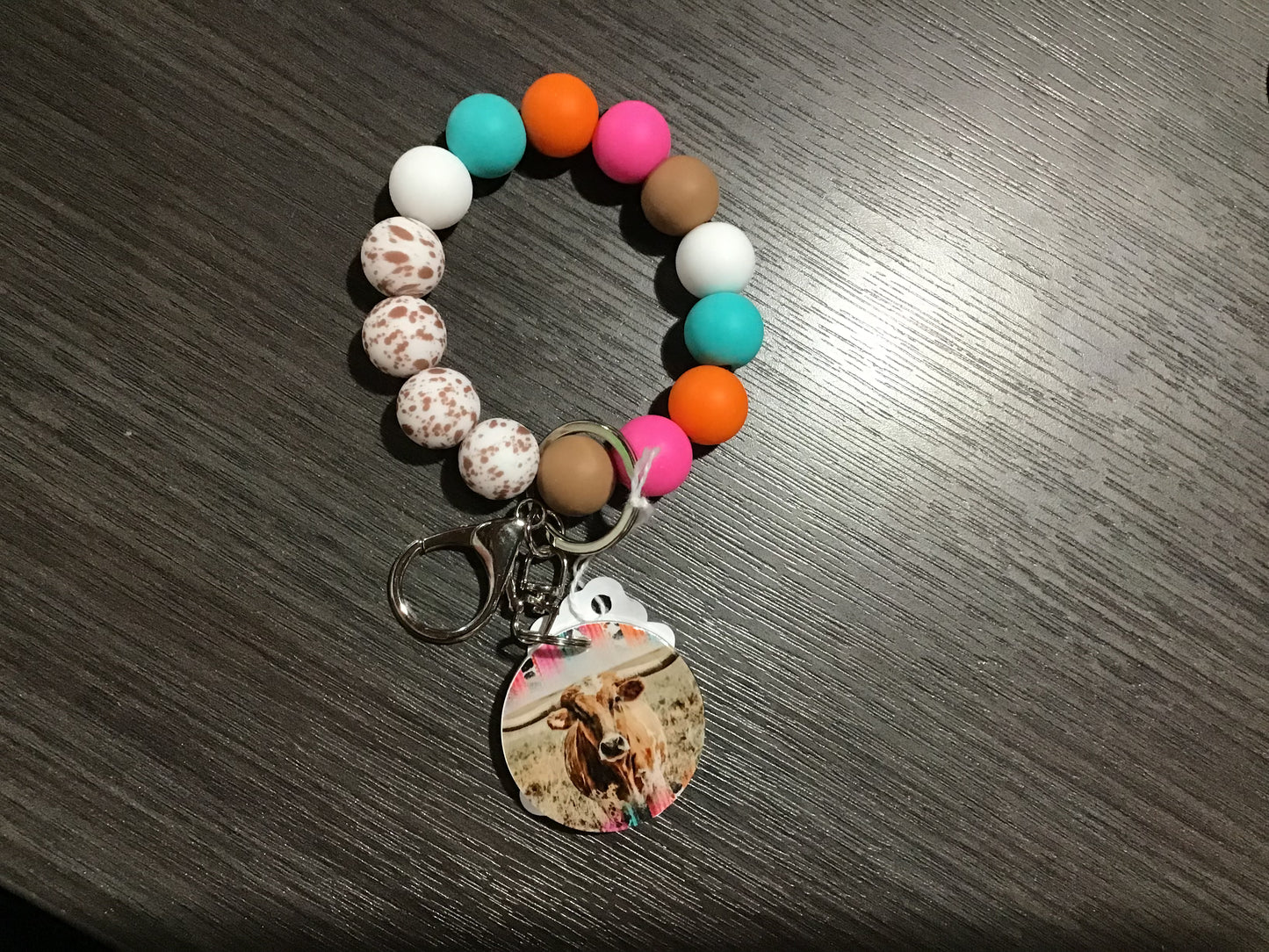 Neon Cow Wristlet