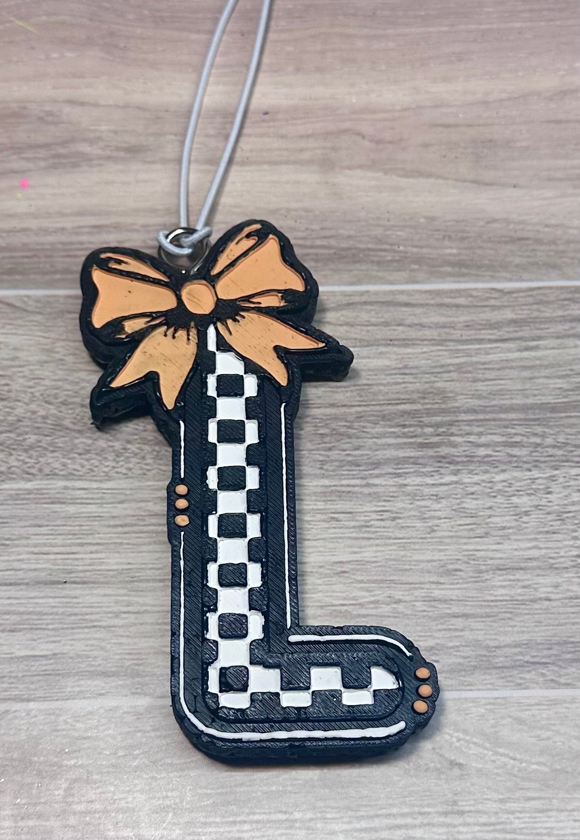 Checkered L - Butt Naked